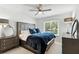 Spacious main bedroom featuring a large bed and natural lighting at 1769 Turnberry Ter, Orlando, FL 32804