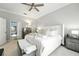 Spacious main bedroom with decorative ceilings and an ensuite bathroom at 1769 Turnberry Ter, Orlando, FL 32804