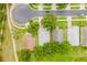 Aerial shot of a neighborhood showcasing the layout of homes, streets, and surrounding green spaces at 2173 Caledonian St, Clermont, FL 34711