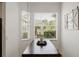 Breakfast nook features lots of natural light and a barn door accent on the right at 2173 Caledonian St, Clermont, FL 34711
