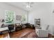 Bright home office with hardwood floors, neutral paint, and lots of natural light at 2173 Caledonian St, Clermont, FL 34711