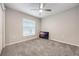 Simple bedroom with ceiling fan and natural light at 220 Foxtail Loop, Davenport, FL 33837