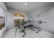 Workout room with sliding door, ample space, and workout equipment at 220 Foxtail Loop, Davenport, FL 33837