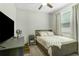 Comfortable bedroom with neutral walls, plush carpet, and natural light at 2491 Wadeview Loop, St Cloud, FL 34769