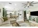 Open concept living area with modern kitchen, dining area and comfortable living room at 2491 Wadeview Loop, St Cloud, FL 34769
