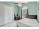 Bedroom featuring unique design with arch window and personal workspace at 2800 Woodsmere Ct, Kissimmee, FL 34746