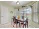 Charming breakfast nook with tile floors, natural light, and room for a dining table at 2800 Woodsmere Ct, Kissimmee, FL 34746
