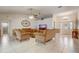 Comfortable living room featuring tile floors, ceiling fan, and ample seating at 2800 Woodsmere Ct, Kissimmee, FL 34746