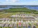 An aerial view showcases a home with a lush green lawn at 3179 Sailing Pier Ave, Winter Garden, FL 34787