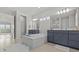 Spacious bathroom with double vanities and a soaking tub, offering a clean and relaxing retreat at 3179 Sailing Pier Ave, Winter Garden, FL 34787