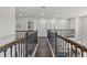 Hallway with a view of the living and dining areas, showcasing the home's open layout at 3179 Sailing Pier Ave, Winter Garden, FL 34787