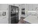 Modern kitchen with stainless steel appliances and custom cabinets at 3179 Sailing Pier Ave, Winter Garden, FL 34787