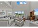 Bright open concept featuring dining room, high ceilings, abundant natural light, and luxury vinyl flooring at 3179 Sailing Pier Ave, Winter Garden, FL 34787