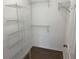 Walk-in closet with metal shelving for optimal storage organization at 3713 S Lake Orlando Pkwy # 6, Orlando, FL 32808