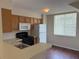 Functional kitchen with matching appliances, ample counter space, and cozy breakfast nook for casual dining at 3713 S Lake Orlando Pkwy # 6, Orlando, FL 32808