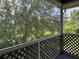 Comfortable screened-in patio providing serene views of the surrounding greenery at 3713 S Lake Orlando Pkwy # 6, Orlando, FL 32808