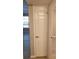 Hallway featuring a door to a room with views of another room beyond at 420 Forestway Cir # 202, Altamonte Springs, FL 32701