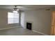 Bright living room with wood-look floors and a fireplace at 420 Forestway Cir # 202, Altamonte Springs, FL 32701