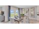 Elegant dining room with seating for six, stylish decor, and a view of the outdoors at 5174 Masser Rd, St Cloud, FL 34772