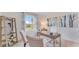 Cozy home office featuring desk, chairs, and window at 5174 Masser Rd, St Cloud, FL 34772