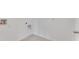 A view of the laundry room with white walls and tile floor at 5174 Masser Rd, St Cloud, FL 34772