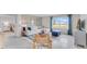 Bright living room with a large window, comfortable seating, and stylish decor at 5174 Masser Rd, St Cloud, FL 34772