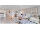Bright living room featuring neutral colors and a relaxed seating arrangement at 5174 Masser Rd, St Cloud, FL 34772
