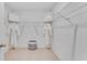 Spacious walk-in closet with ample shelving and storage space for an organized wardrobe at 5174 Masser Rd, St Cloud, FL 34772