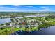 Aerial view of the neighborhood highlighting the lake access, community, and nearby nature at 5552 Remsen Cay Ln, Windermere, FL 34786