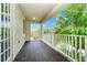 Outdoor balcony overlooking lush greenery and offering serene views at 5552 Remsen Cay Ln, Windermere, FL 34786
