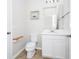 Clean, well-lit bathroom featuring a white vanity, modern toilet, and neutral color scheme at 5552 Remsen Cay Ln, Windermere, FL 34786