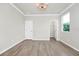 Spacious bedroom with walk-in closet, light floors, and natural light at 5552 Remsen Cay Ln, Windermere, FL 34786