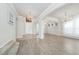 Open foyer with hardwood floors and elegant chandeliers at 5552 Remsen Cay Ln, Windermere, FL 34786