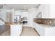 Spacious kitchen showcasing a large island, stainless steel appliances, and ample cabinet space at 5552 Remsen Cay Ln, Windermere, FL 34786