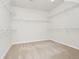 A walk-in closet with carpeted floors and wire shelving at 5552 Remsen Cay Ln, Windermere, FL 34786