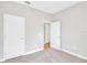 Bedroom boasts neutral walls and plush carpet at 6291 Sw 133Rd Street Road, Ocala, FL 34473