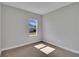 Bright bedroom with neutral walls and plush carpet at 6291 Sw 133Rd Street Road, Ocala, FL 34473