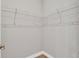 Walk-in closet features wire shelving and neutral wall paint at 6291 Sw 133Rd Street Road, Ocala, FL 34473