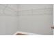 Walk-in closet features wire shelving and neutral wall paint at 6291 Sw 133Rd Street Road, Ocala, FL 34473