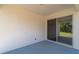Covered patio with sliding glass doors provides seamless indoor-outdoor living at 6291 Sw 133Rd Street Road, Ocala, FL 34473