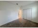 A bedroom featuring carpeted floors and a closet at 6300 Chirpine Ln, St Cloud, FL 34771