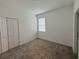 Bright bedroom with double door closet and large window at 6300 Chirpine Ln, St Cloud, FL 34771