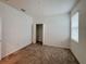 Bedroom featuring neutral carpet, closet and window with blind at 6300 Chirpine Ln, St Cloud, FL 34771