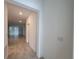 Hallway features tile flooring at 6300 Chirpine Ln, St Cloud, FL 34771