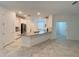 Bright, open kitchen boasts stainless steel appliances, a large island and tile flooring at 6300 Chirpine Ln, St Cloud, FL 34771