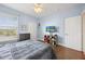 Serene bedroom with natural light and nice floors, creating a restful ambiance at 8816 Dunes Ct # 303, Kissimmee, FL 34747