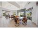 Bright dining area with plenty of seating and large windows offering great outdoor views at 8816 Dunes Ct # 303, Kissimmee, FL 34747