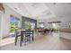 Bright dining area with plenty of seating and large windows offering great outdoor views at 8816 Dunes Ct # 303, Kissimmee, FL 34747