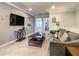 Upstairs Bonus room features comfy seating, TV and view to hallway at 8911 Geneve Ct, Kissimmee, FL 34747