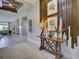 Elegant foyer with decorative wood wall, stylish console table, and views into the living area at 9979 Winnington St, Orlando, FL 32832